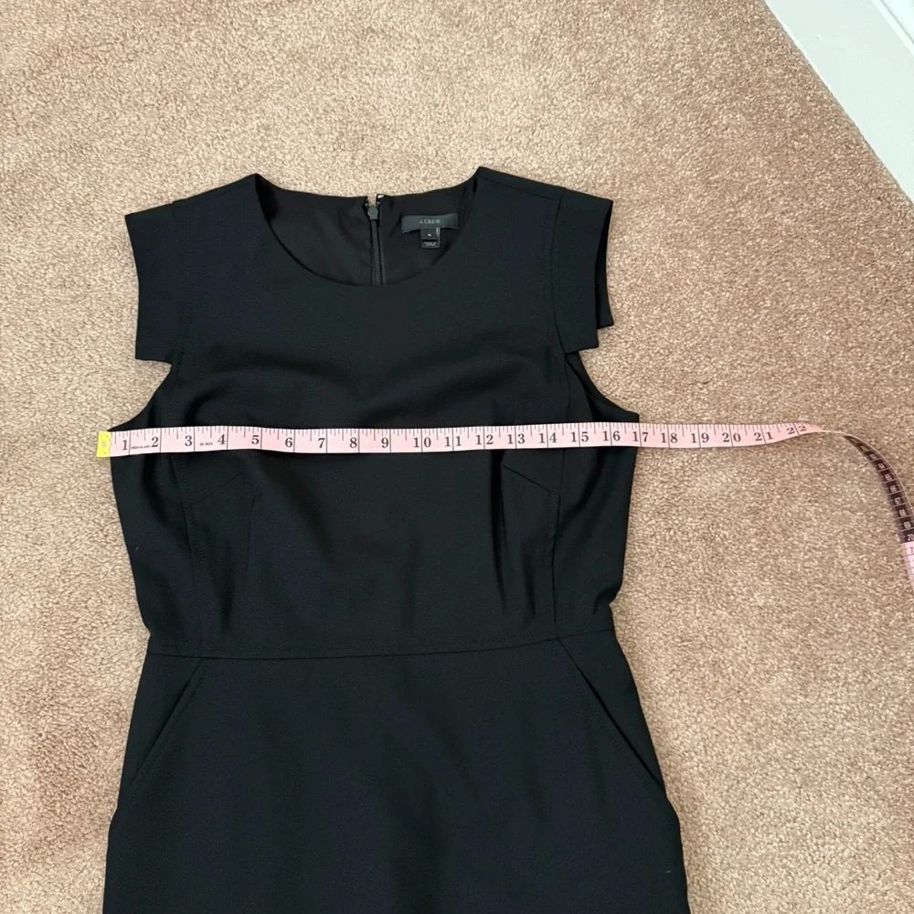 J. Crew Elegant Black Resume Dress. Pockets, back vent and zipper. Sleeveless.